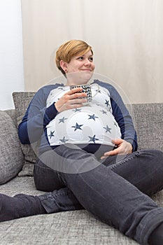 Pregnant Woman with a cup of Tea