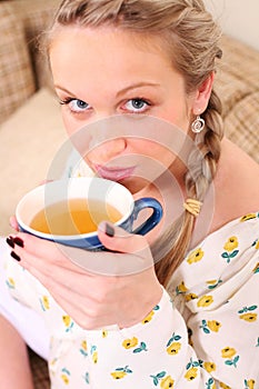 Pregnant woman with a cup of tea