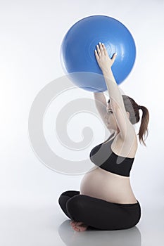 Pregnant woman doing exercises