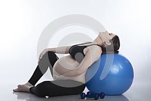 Pregnant woman doing exercises