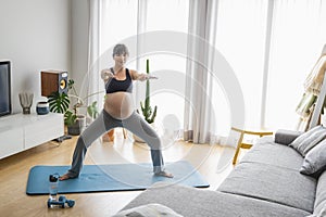 Pregnant woman doing exercises