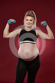 Pregnant woman doing fitness