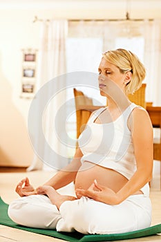 Pregnant woman doing pregnancy yoga