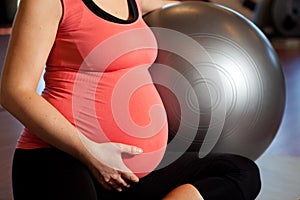 Pregnant woman doing relaxation exercise