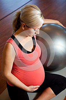 Pregnant woman doing relaxation exercise