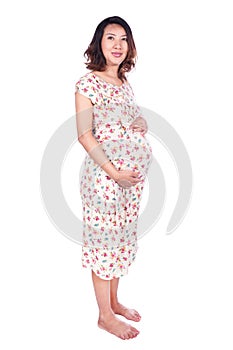 Pregnant woman in dress isolated on white background