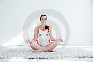 A pregnant woman is engaged in gymnastics and yoga