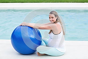 Pregnant woman with exercise ball