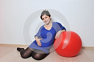 Pregnant woman exercises