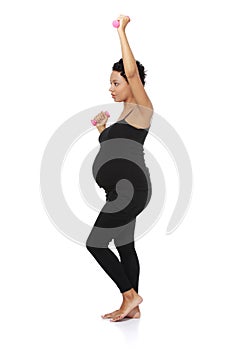 Pregnant woman during exercising.