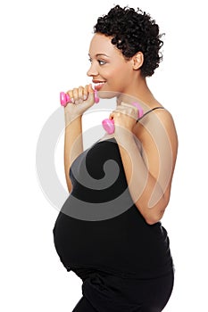 Pregnant woman during exercising.