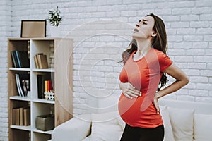 Pregnant Woman Feeling a Backache