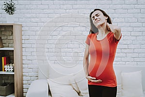 Pregnant Woman Feeling a Neck Pain