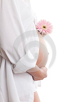 Pregnant woman with flower