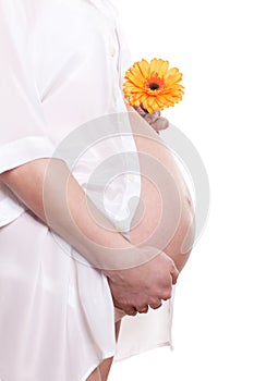 Pregnant woman with flower