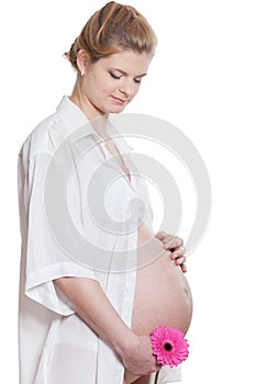 Pregnant woman with flower