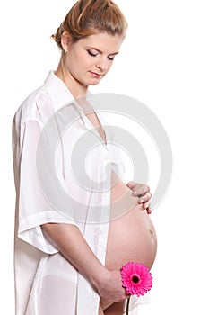 Pregnant woman with flower