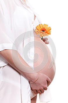 Pregnant woman with flower