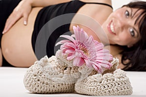 Pregnant woman with flower