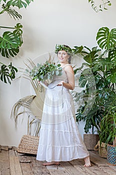 Pregnant woman with flowers bouquet