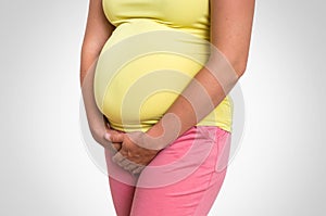 Pregnant woman with frequent urination problem