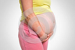 Pregnant woman with frequent urination problem photo