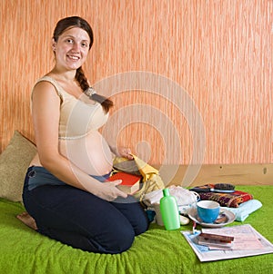 Pregnant woman get ready for maternity clinic