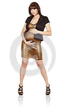 Pregnant woman in gold dress