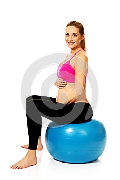 Pregnant woman with gymnastic ball