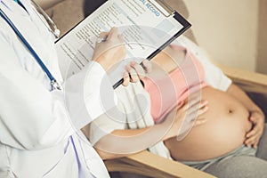 Pregnant Woman and Gynecologist Doctor at Hospital