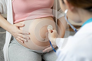 Pregnant Woman and Gynecologist Doctor at Hospital