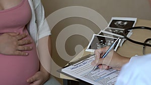 Pregnant Woman and Gynecologist Doctor at Hospital