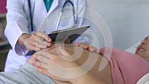 Pregnant Woman and Gynecologist Doctor at Hospital