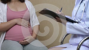 Pregnant Woman and Gynecologist Doctor at Hospital