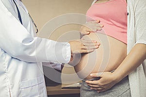 Pregnant Woman and Gynecologist Doctor at Hospital