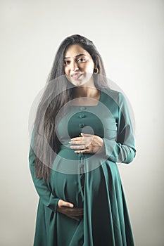 pregnant woman hand on the belly