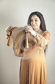 pregnant woman hand bodysuit