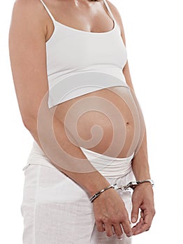 Pregnant Woman Hands attached with handcuffs