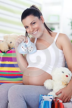 Pregnant woman has bought things for your baby