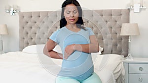 Pregnant woman having back pain