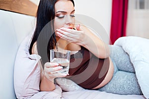 Pregnant woman having nausea