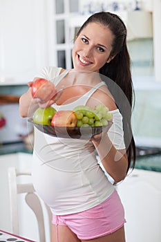 Pregnant woman and healthy food