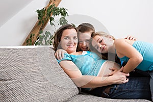 Pregnant woman with her children