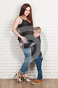 Pregnant woman with her elder son