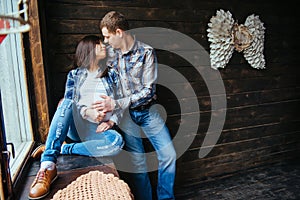 Pregnant woman with her husband waiting for newborn