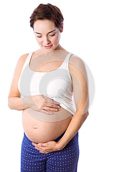 Pregnant woman holding her bump