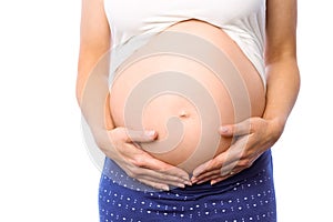 Pregnant woman holding her bump