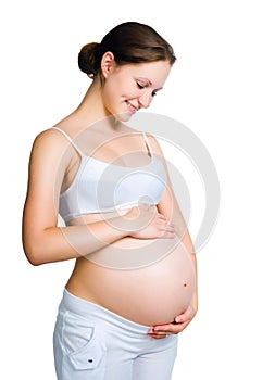 Pregnant woman holding piggy bank