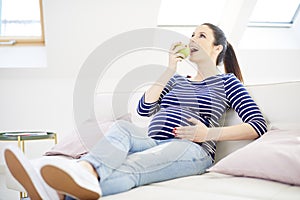 Pregnant woman at home