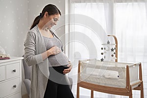 Pregnant woman at home